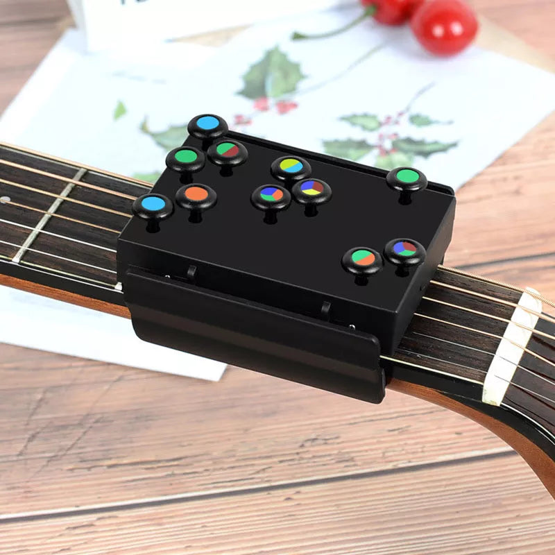 Chord Buddy Guitar Trainer with color-coded buttons for easy chord learning