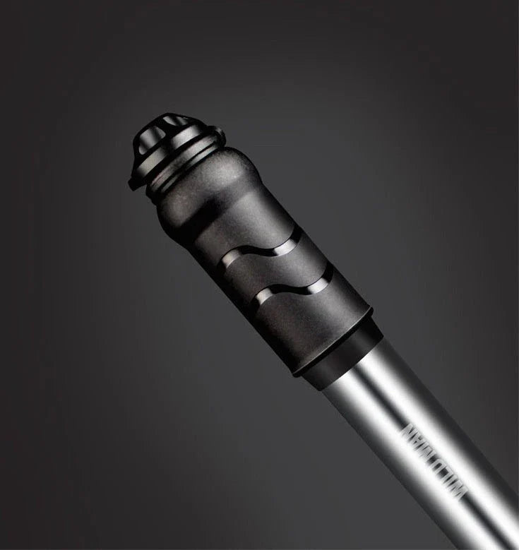 Premium high-pressure portable bicycle pump with built-in hose and versatile nozzle for mountain and road bikes