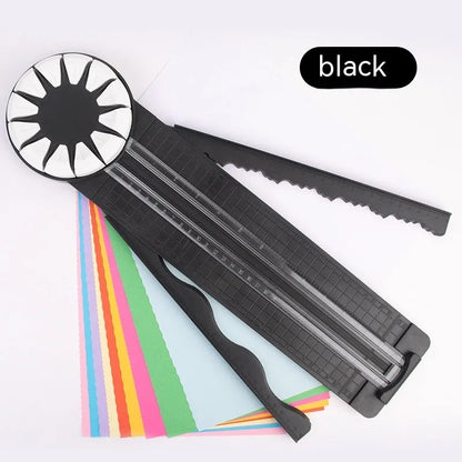 Pink 12-in-1 paper cutter with dotted guides measuring 46.2cm length on craft table