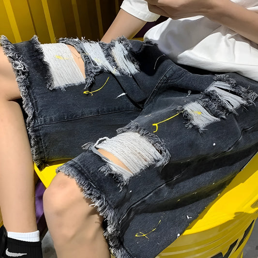 Man wearing loose-fit light blue washed denim shorts with a fifth-pants length, showcasing street style.