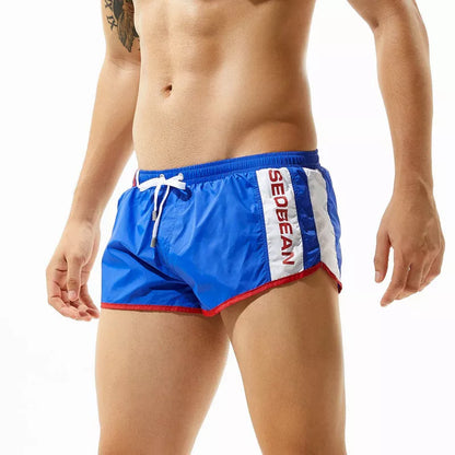 Men's lightweight polyester shorts for summer sports in various colors