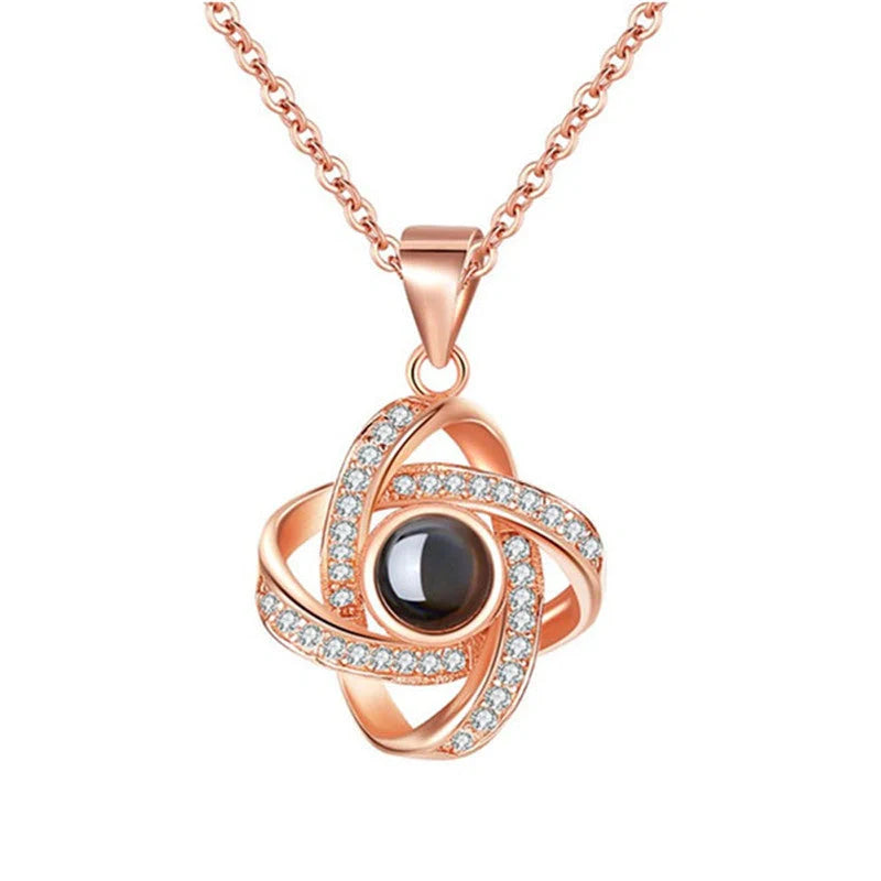 Four-leaf clover diamond necklace with hidden love words projection feature in S925 sterling silver