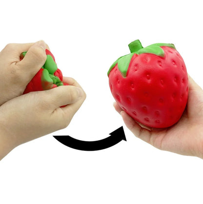 A squishy, strawberry-shaped stress relief ball made of durable polyurethane material