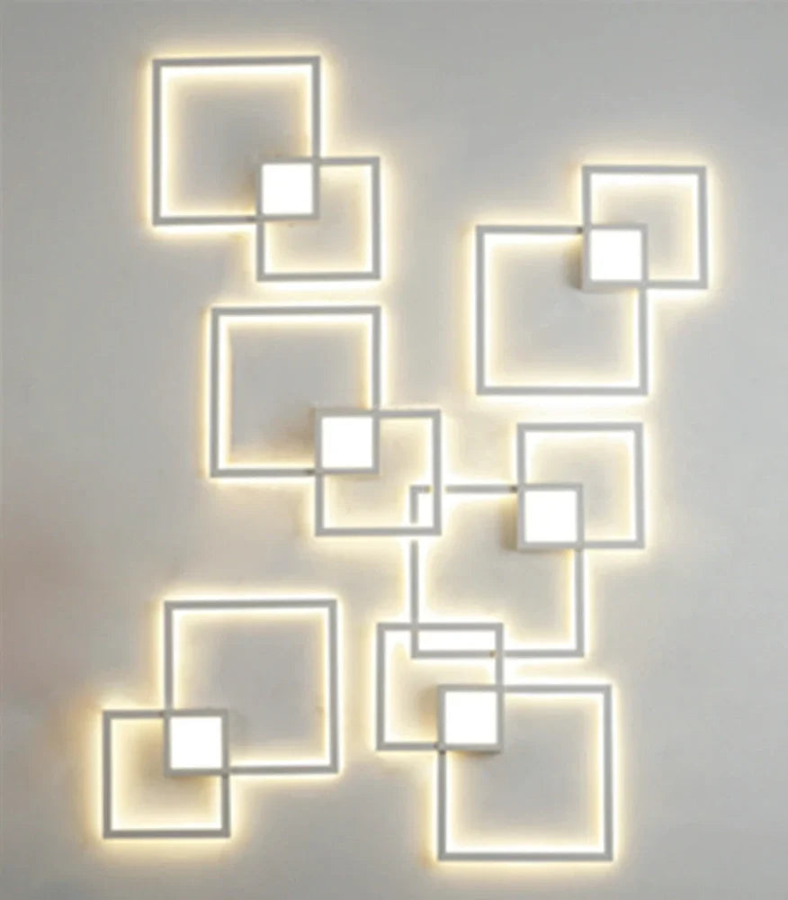 Square 35.3cm geometric LED wall light in white, iron frame with acrylic diffuser, 20W-24W output
