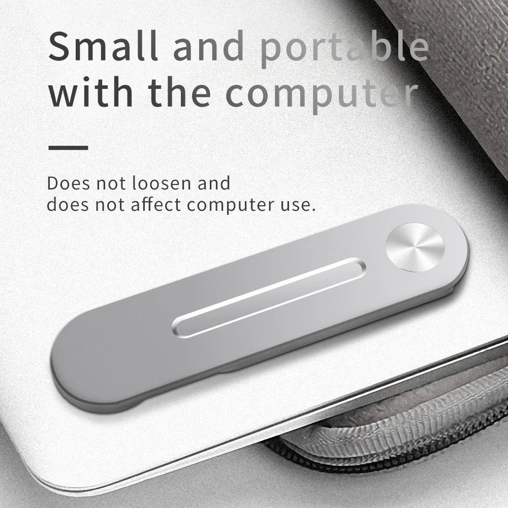 Silver aluminium alloy laptop side mount bracket holding a mobile phone next to a laptop screen.