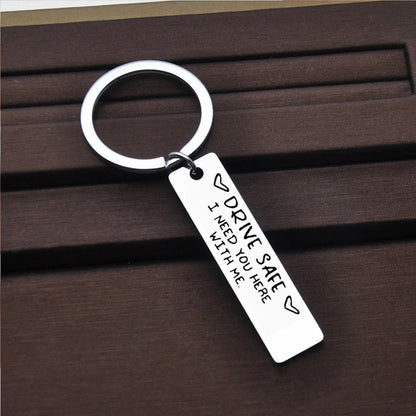 Personalized stainless steel keychain for men with a classic round design