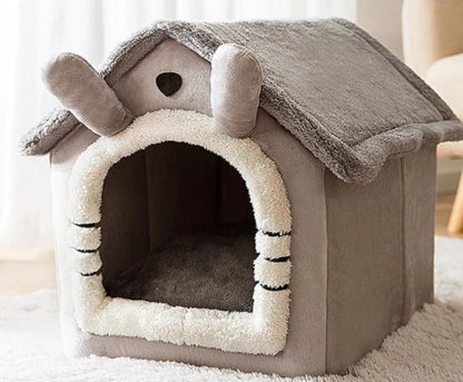 A cozy and comfortable pet bed with a self-warming fabric, durable non-slip base, and removable machine-washable cover