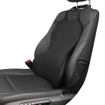 Memory cotton car lumbar support cushion in grey, showing its contoured shape on a car seat.
