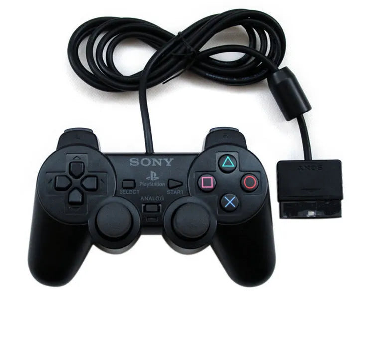PS2 wired vibration game controller in metallic finish with USB connection cable