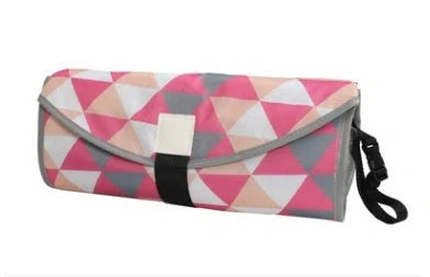 Portable and Waterproof Baby Changing Pad in various color designs, featuring a compact folded size and generous expanded size for comfortable diaper changes