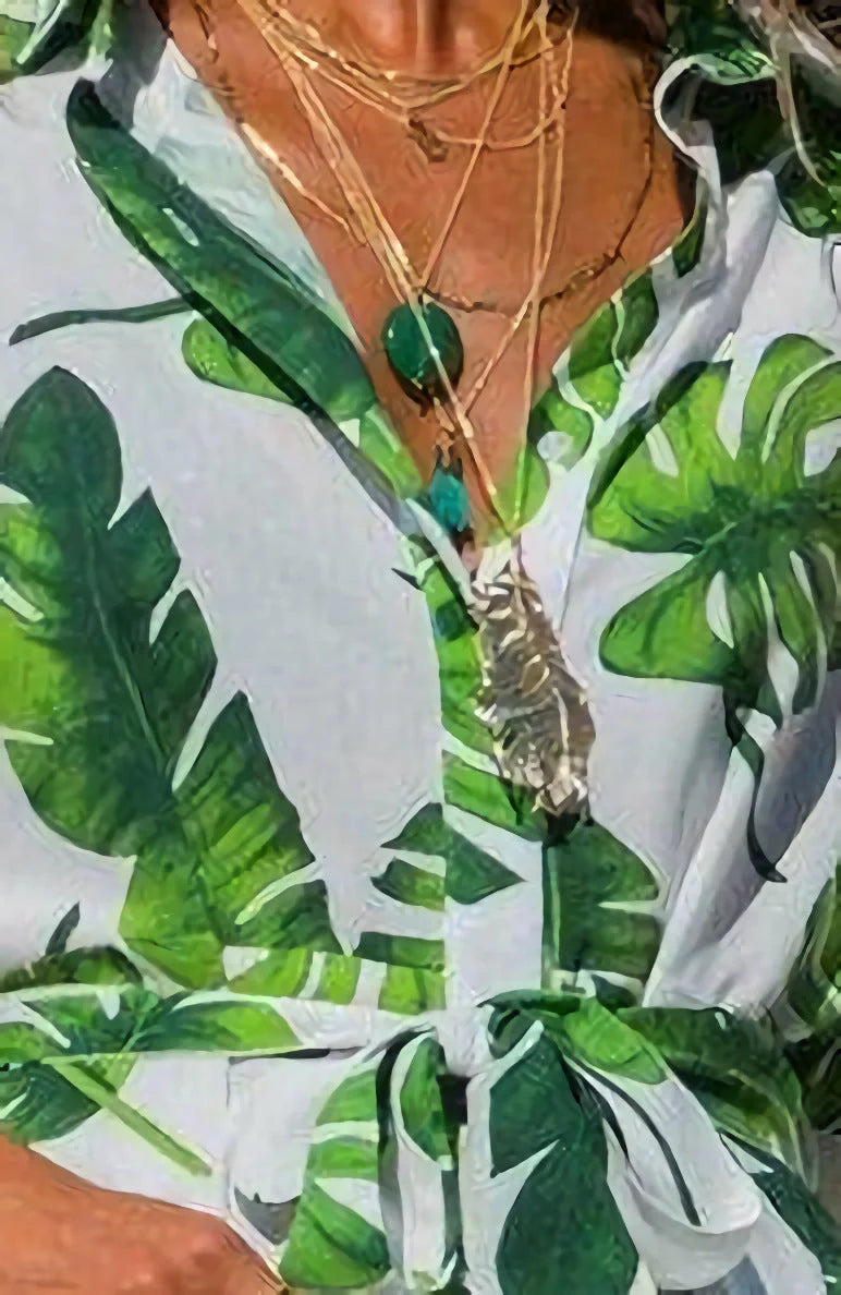 Madrid Vintage Chiffon Dress in various colors and sizes, featuring a V-neck and A-line skirt design