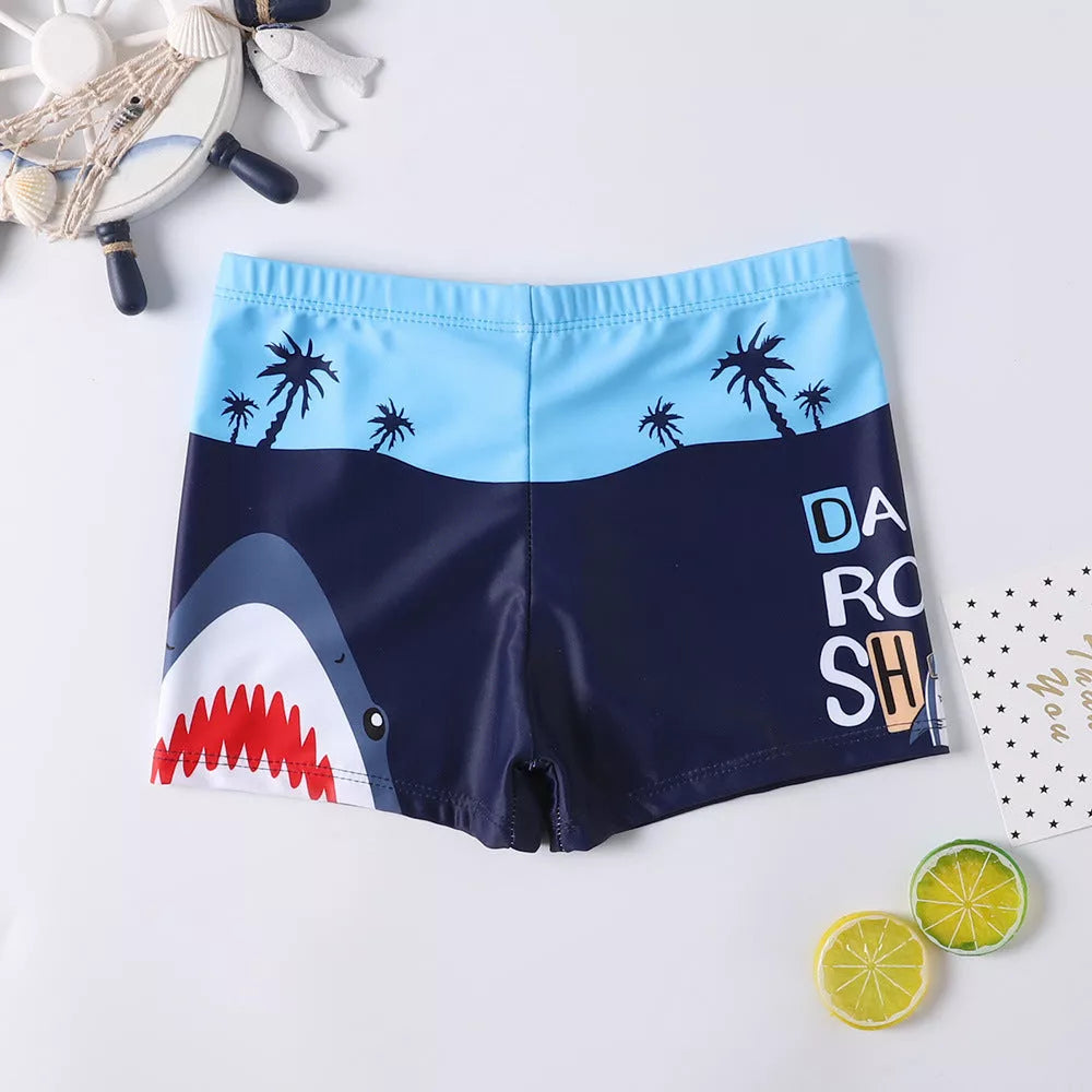 Cartoon boy swimsuit in shark, light blue, and navy blue designs, sizes M to XXL