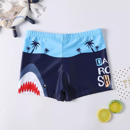 Cartoon boy swimsuit in shark, light blue, and navy blue designs, sizes M to XXL