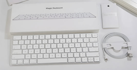 White Apple G6 ultra-thin metal Bluetooth wireless keyboard on a desk