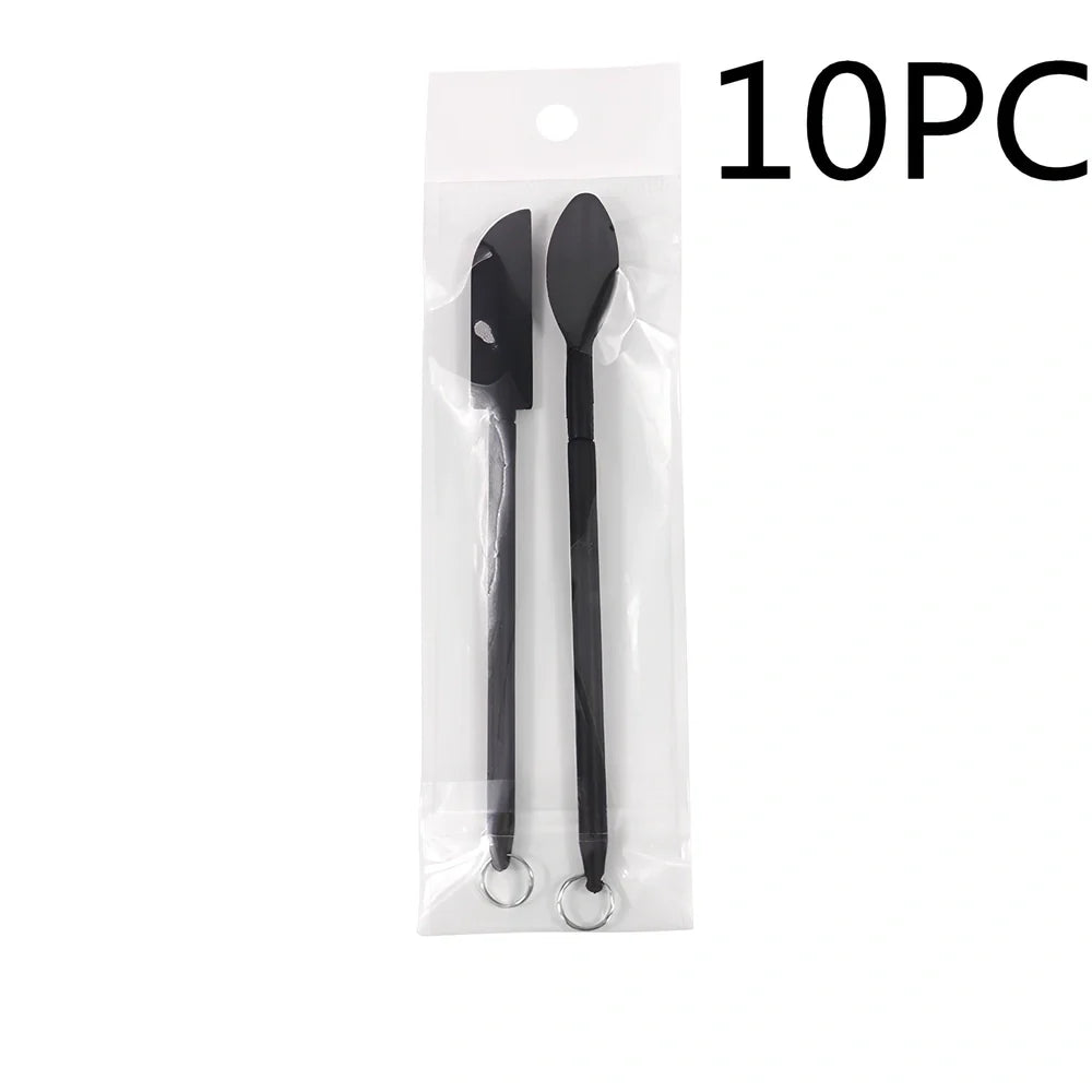 Retractable silicone cosmetic spatula extended to 15cm with scraper tool for product application