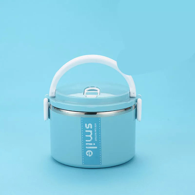 Stainless steel lunch box with built-in spoon, leak-proof design, available in green, pink, and blue