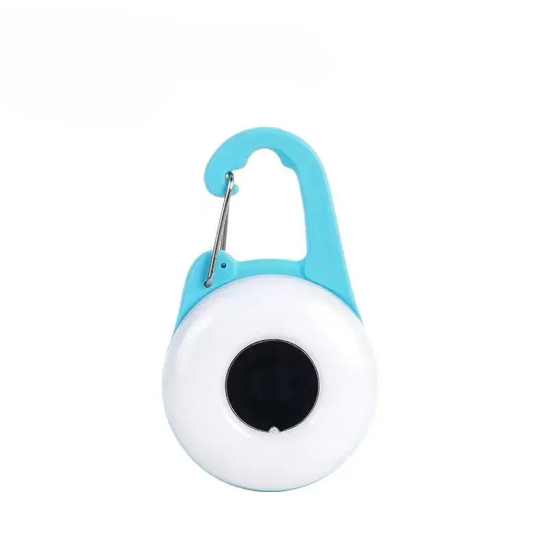 Blue USB-rechargeable LED dog collar light with adjustable silicone strap showing four lighting modes and waterproof stopper