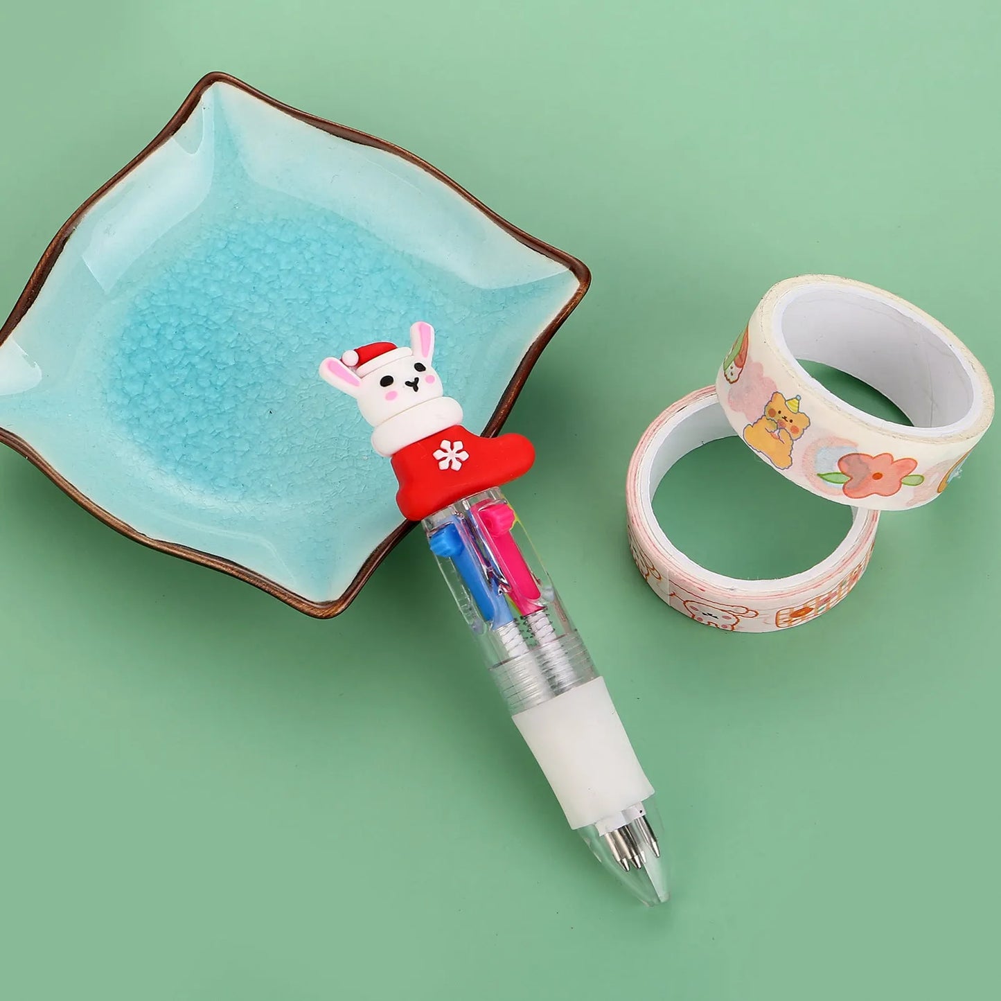 Christmas four-colour ballpoint pen with press mechanism showing festive designs