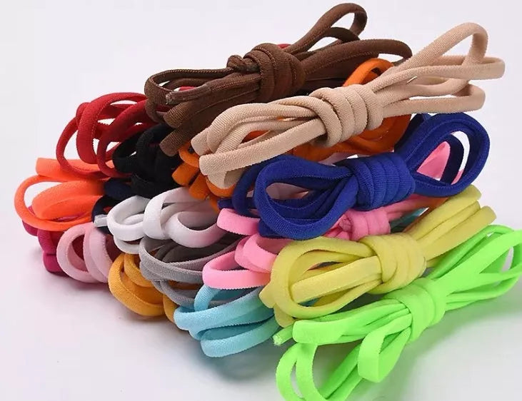 Lazy Laces shoe laces with metal buckles in various colors for a secure fit
