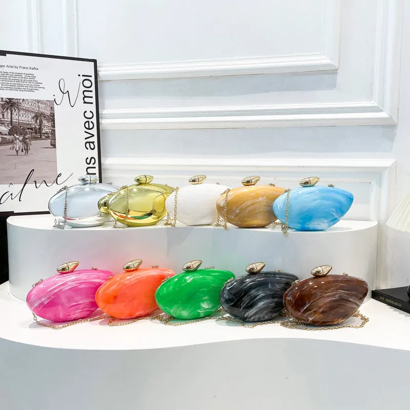 Oval shell goose egg acrylic evening bag with chain shoulder strap, hard outer and mobile phone bag section