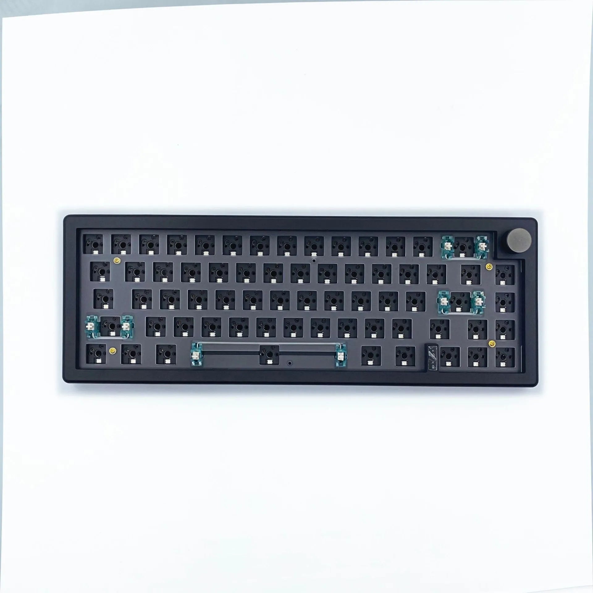Customisable DIY mechanical keyboard kit with RGB backlighting and control knob, shown in multiple colour options