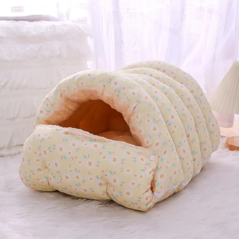 Closed winter cat nest with floral pattern, showing removable design and soft cloth fabric.