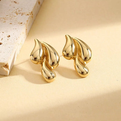Vintage gold and silver double water drop earrings with glossy finish