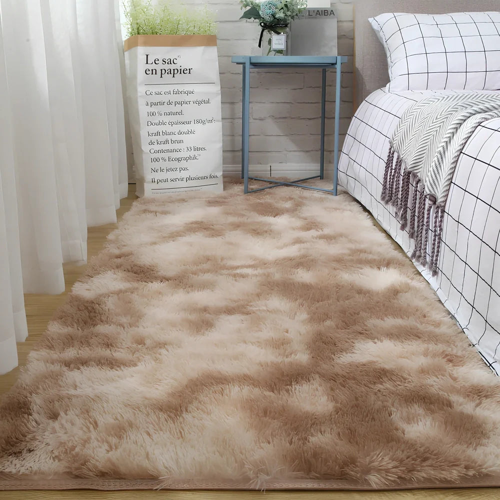 Tie-dyed variegated silk wool carpet floor mat showing organic colour patterns with polyester fibre suede backing