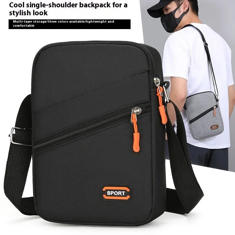 Oxford cloth crossbody commuter bag with contrast colour trim in silver grey