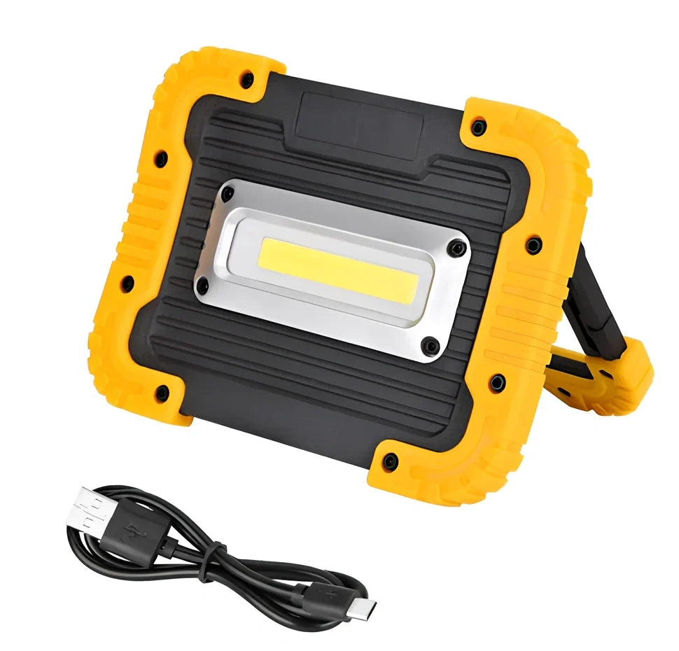 LED camping lantern with rotatable support showing USB ports and battery indicator lights