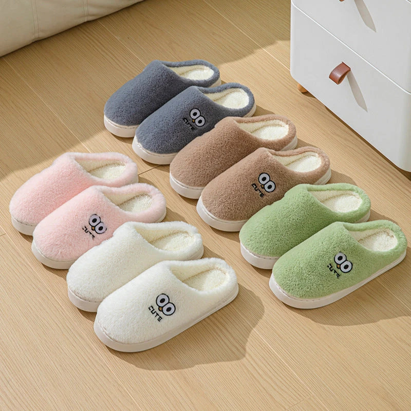 Cozy cartoon slippers with big eyes, available in various colors and sizes for couples to enjoy at home