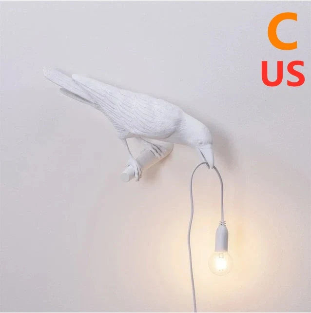 Elegant Resin Bird Wall Lamp illuminating a cozy room with its unique design