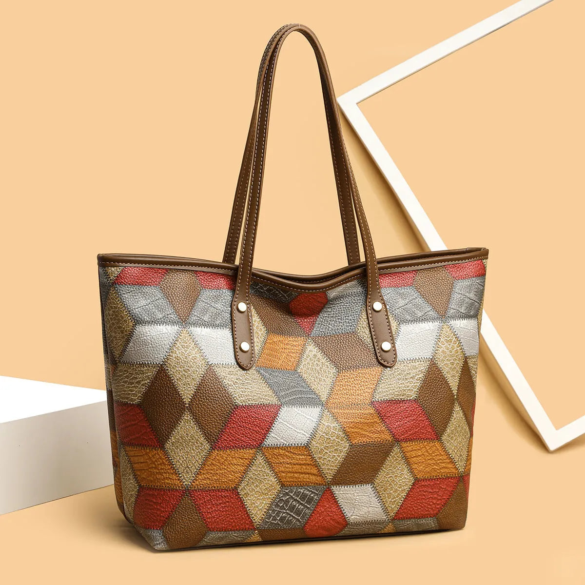 Women's PVC shoulder handbag in blue brown colour with sandwich pocket organisation