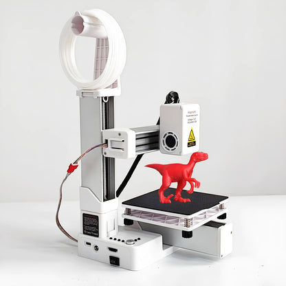 White EasyThreed K10 3D printer on a desktop with power cord and instruction manual