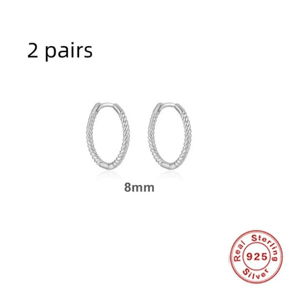 Sterling silver twisted string round ring earrings in gold or platinum colour.