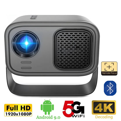 Black HD smart portable projector with remote control and cables on a table