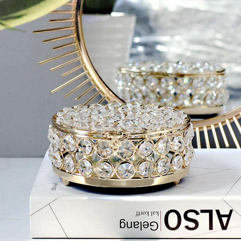 French gold iron jewellery box with crystal glass panels showing jewellery inside