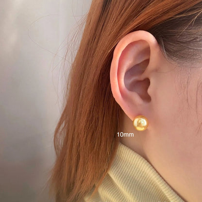 Large pearl stud earrings with geometric retro design and star elements in silver