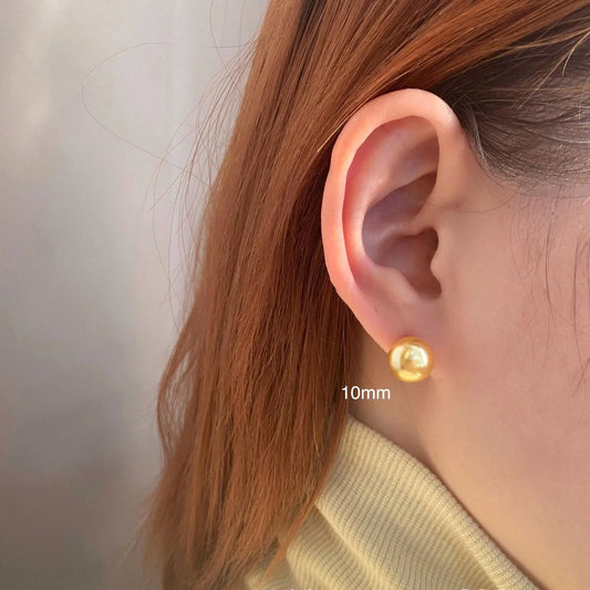 Large pearl stud earrings with geometric retro design and star elements in silver