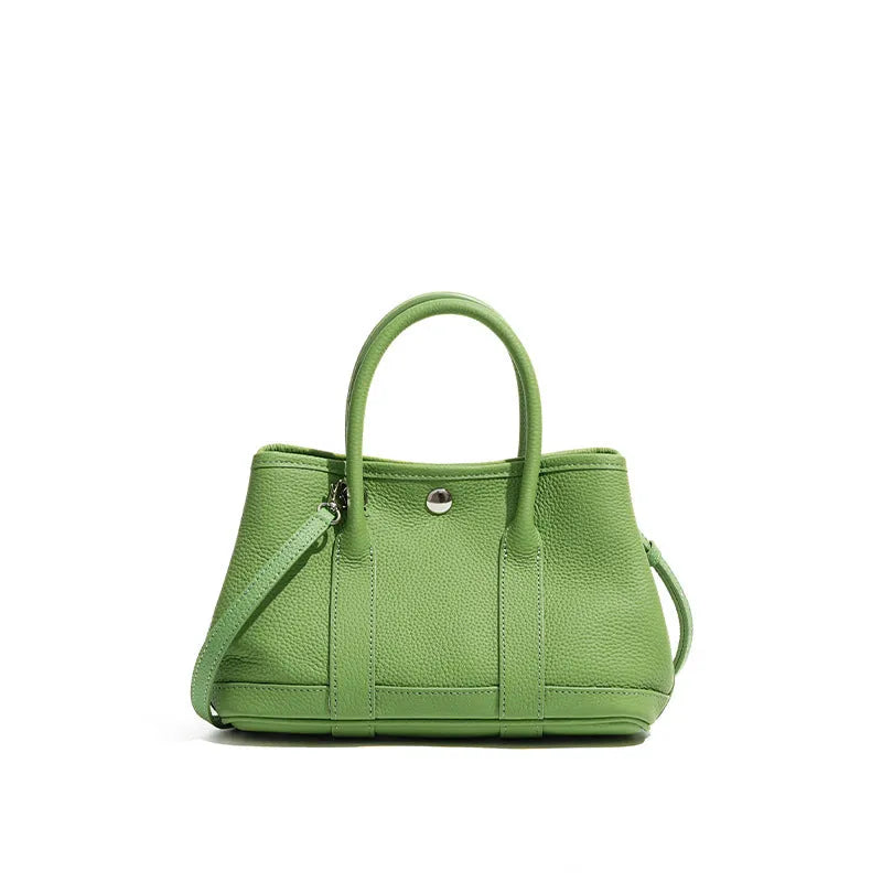 Genuine leather crossbody bag for women in first layer cowhide, horizontal square shape, single shoulder strap, shown in chicken yellow