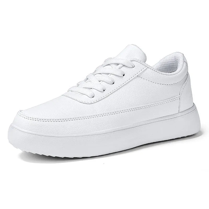 Women's lightweight leather flat casual shoes in gold colour with front lace-up design on a white background