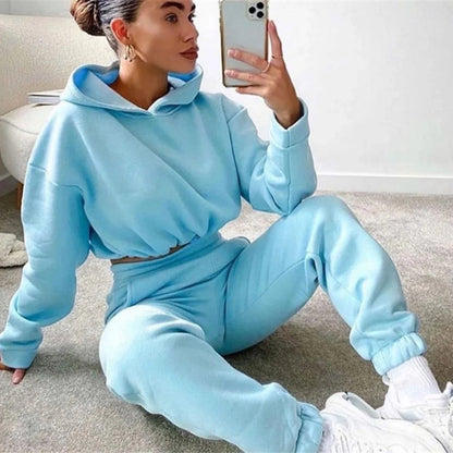 Stylish and comfortable 2-piece tracksuit set for women featuring a hoodie and relaxed-fit pants in a variety of vibrant colors
