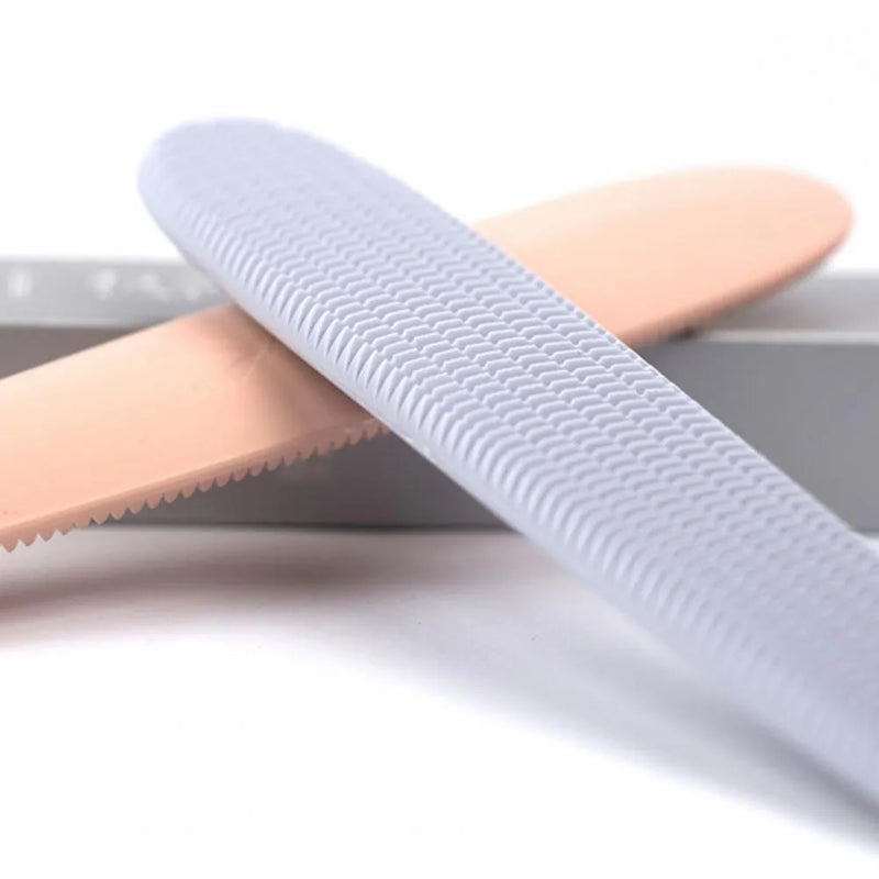 Cat comb durable pet hair remover brush with tongue massage action made from soft ABS material for comfortable at-home grooming of cats and dogs, available in grey or pink, featuring both narrow and wide ends for different body areas