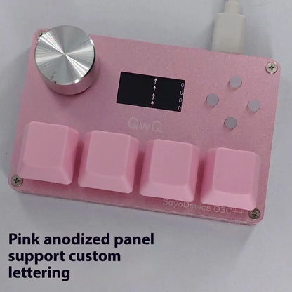 Magnetic axis numeric game keypad with programmable knob and colour screen on desk