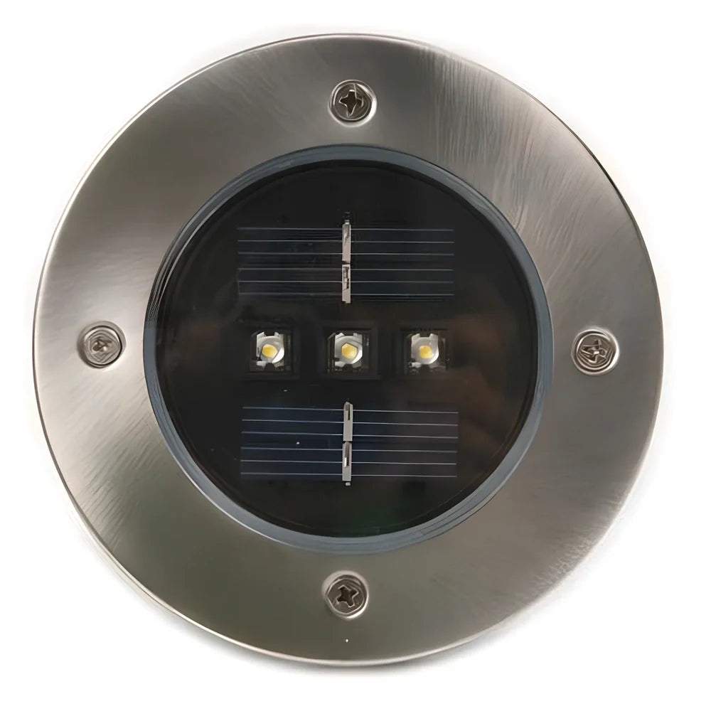 Stainless steel solar garden light measuring 11.5x11.5x13cm with automatic dusk operation