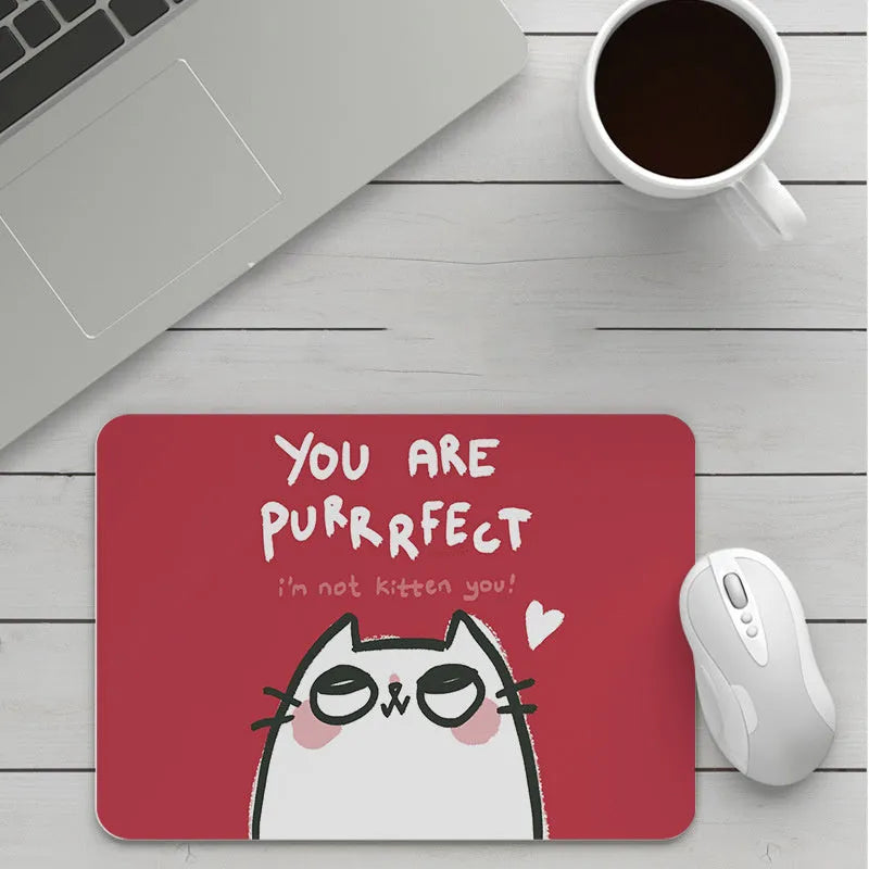 Customisable thick cartoon mouse pad with non-slip base, showing sample patterns like strawberry, cat, and whale designs.