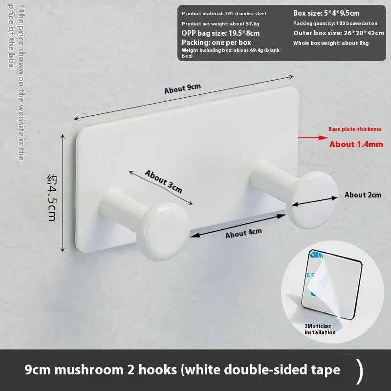 Screwless mushroom-style clothes hook with adhesive backing, shown in white on a tiled wall.