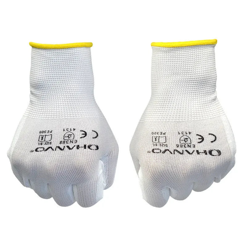 Pair of white PU coated work gloves showing palm coating and breathable back, laid flat.