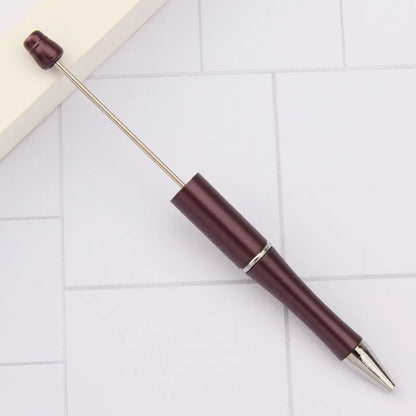 Rotating bead ballpoint pen in gradient colour with ABS plastic and steel wire construction