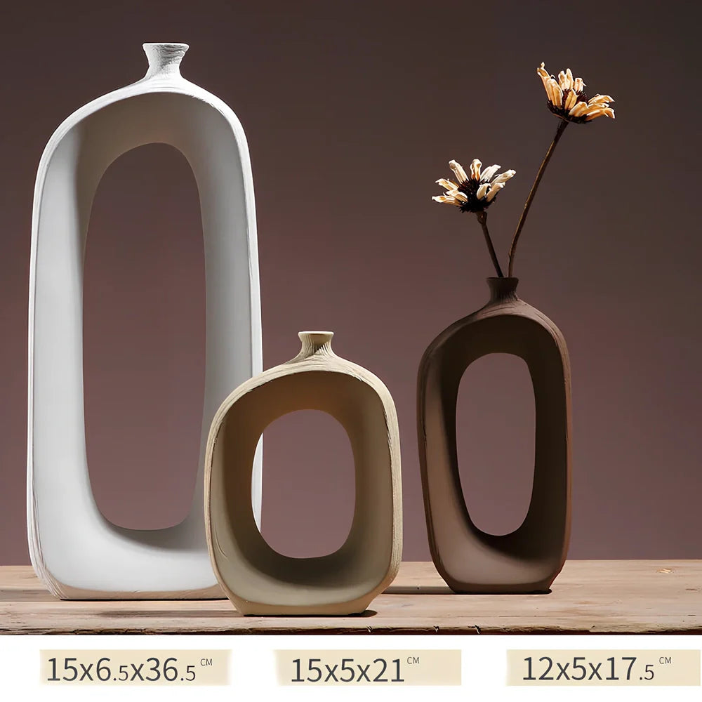 Three white ceramic vases with hand-drawn cloud patterns in 25cm, 20cm, 15cm sizes